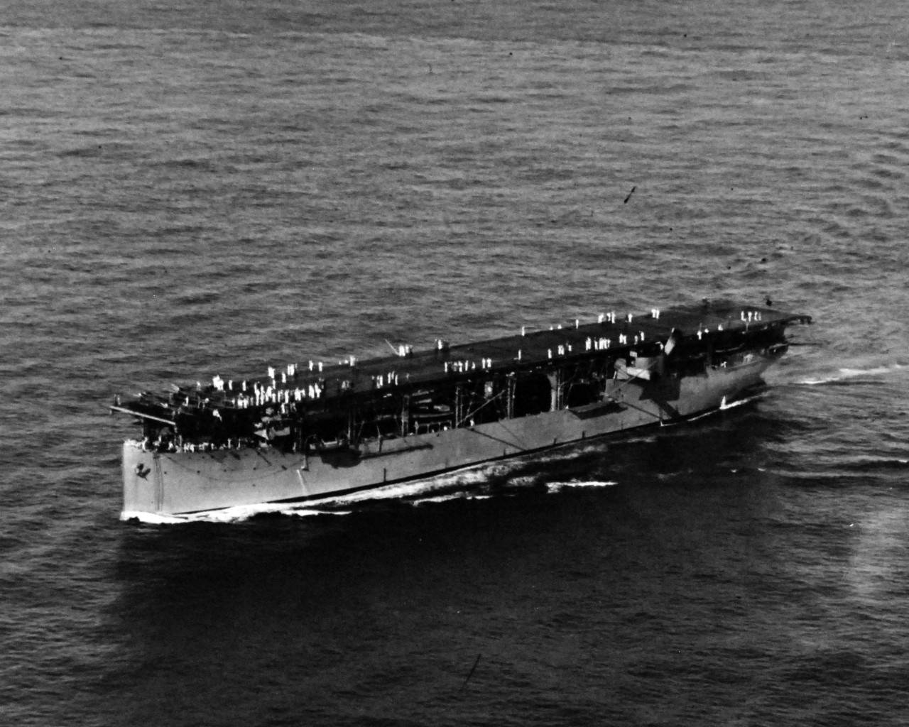 80-G-410459:  USS Langley (CV-1), 1925.    Aircraft carrier shown approximately 100 miles south west of Pearl Harbor, Territory of Hawaii, 26 April 1925.  Official U.S. Navy photograph, now in the collections of the National Archives.   (2014/02/27).    