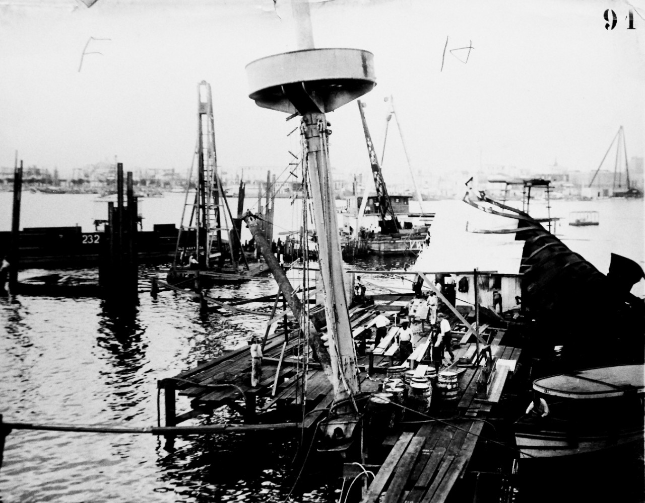 LC-Lot 8936-1:  USS Maine (1895-98), 1910.  Raising Maine’s wreck in Havana Harbor, Cuba, December 28, 1910.  Her mast is shown along with cylinders “F” and “H” as the cofferdam is being built.  Maine exploded on February 15, 1898, and was one of the causes for the United States to enter war with Spain, Spanish-American War, April-August 1898.  Transfer from the War Department, Washington.  Courtesy of the Library of Congress.    (2015/10/2).