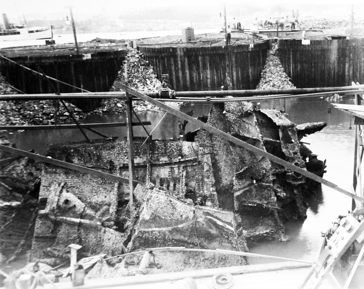 LC-Lot 8936-24:  USS Maine (1895-98).  Raising Maine’s wreck in Havana Harbor, Cuba, July 7, 1911.  Shown: bow and amidships wreckage.  Maine exploded on February 15, 1898, and was one of the causes for the United States to enter war with Spain, Spanish-American War, April-August 1898.  Transfer from the War Department, Washington.   (2015/10/2).