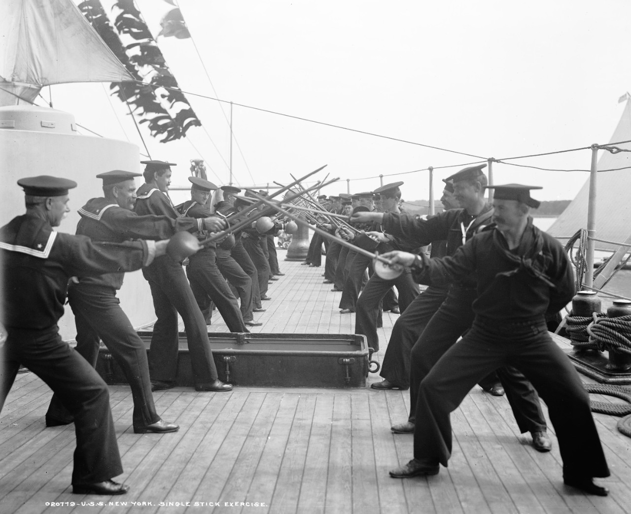 LC-DIG-DET-4a14561:   USS New York (Armored Cruiser #2), 1899.  Single stick exercise.  Photographed by Detroit Publishing Company, 1899, possibly.  Courtesy of the Library of Congress.  (2015/6/5).