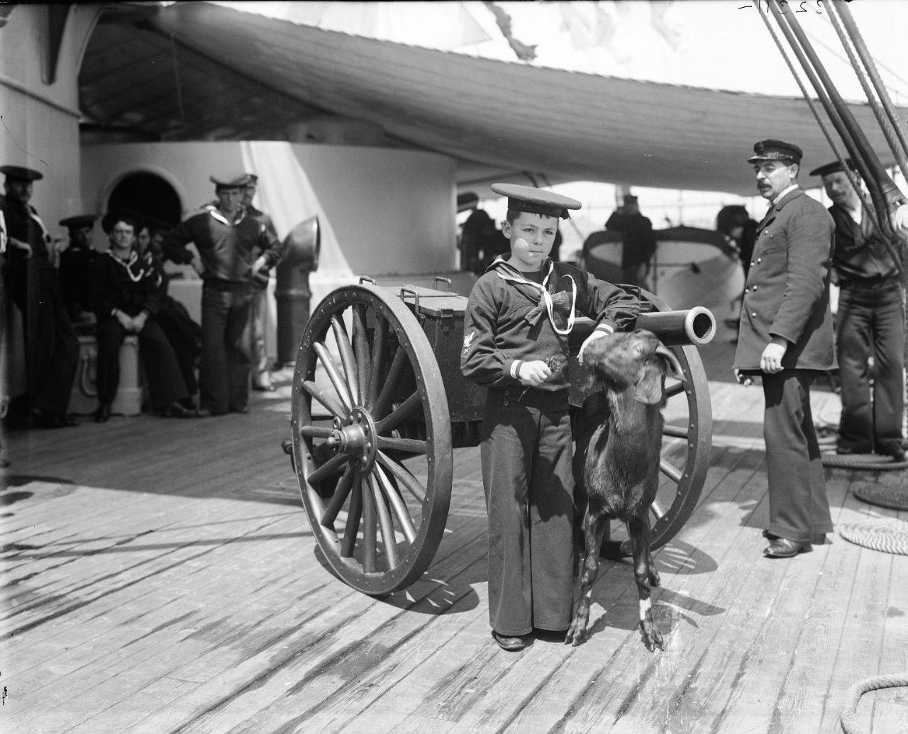 LC-DIG-DET-4a16553:  USS New York (Armored Cruiser #2), 1899.   Rear Admiral William T. Sampson’s son and Mascot, Pitch.  Photographed by Edward H. Hart, Detroit Publishing Company, 1899.  Courtesy of the Library of Congress.  (2015/6/5).