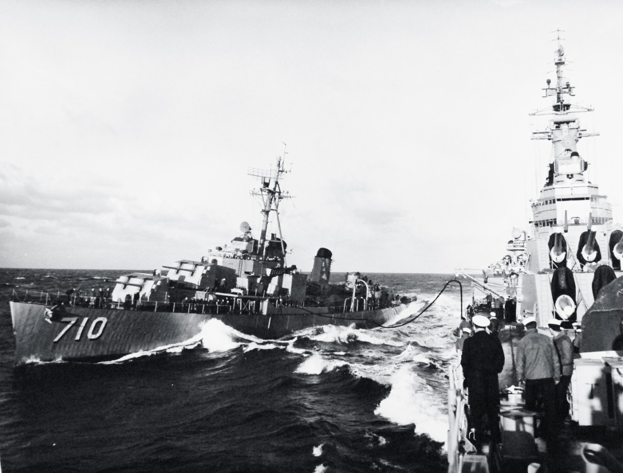 330-PS-1132:   USS Newport News (CA-148), February 1952.    Combined US-British Exercises in the Mediterranean.  USS Gearing (DD 710) fueling from Sixth Fleet Flagship USS Newport News (CA-148) during combined U.S. and British Naval Exercises February 12-13, 1952, in the Mediterranean.   Also at National Archives as USN 708112.   Official U.S. Navy Photograph, now in the collections of the National Archives.  (2015/06/30).   