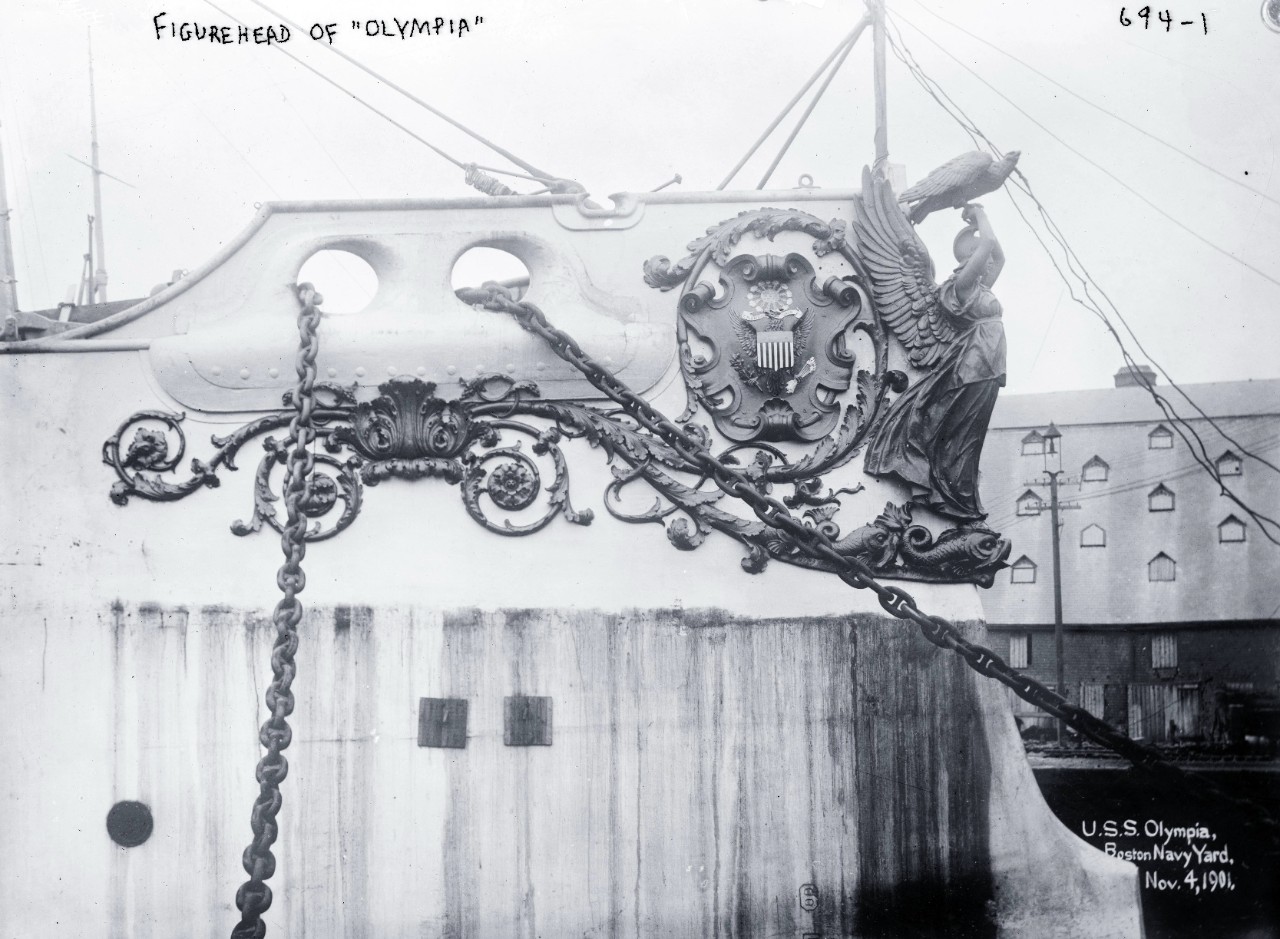 LC-DIG-GGBAIN-03311:  USS Olympia (Cruiser #6), 1901.  Figurehead, while at Boston Navy Yard, November 4, 1901.   George Grantham Bain Collection.  Courtesy of the Library of Congress.  (2015/05/29). 