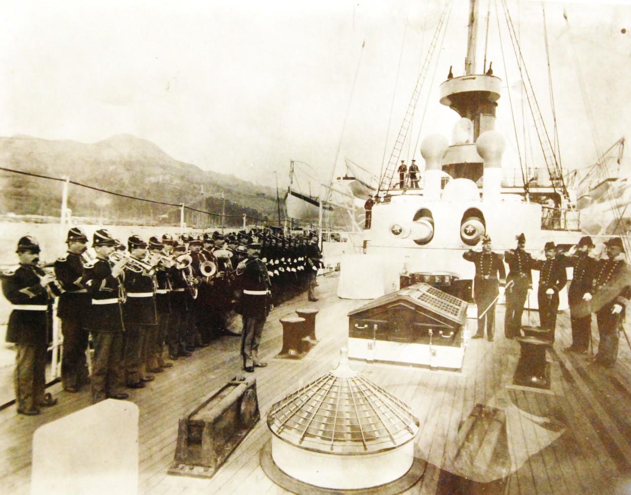LC-J698-61254: USS Olympia (Cruiser #6), 1899.   Olympia band and ceremony on deck, circa 1899.  Photograph by Francis B. Johnston. Courtesy of the Library of Congress, Lot 8688.    (2015/5/15). 