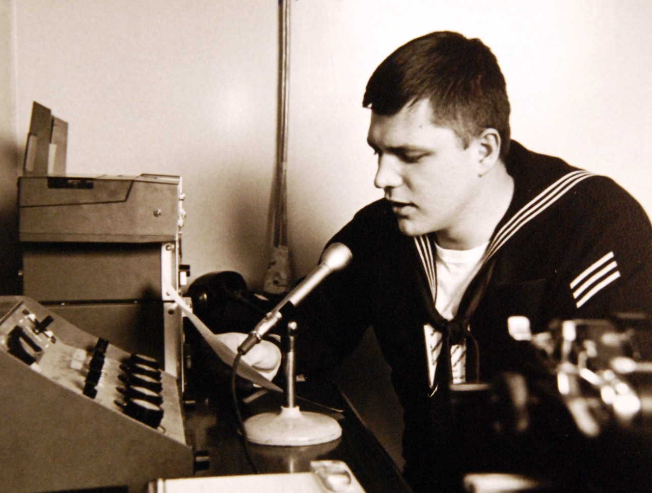 428-GX-USN-1140145:   U.S. Naval Station, San Diego, California, February 27, 1969.    A sailor at work in the command information bureau.  Information on the work of the Court of Inquiry on the capture of USS Pueblo (AGER-2) is being handled by the bureau.  Photographed by JOSN J.W. Fletcher, USN.   Official U.S. Navy Photograph, now in the collections of the National Archives (2017/05/23).  Photographed from reference card.  
