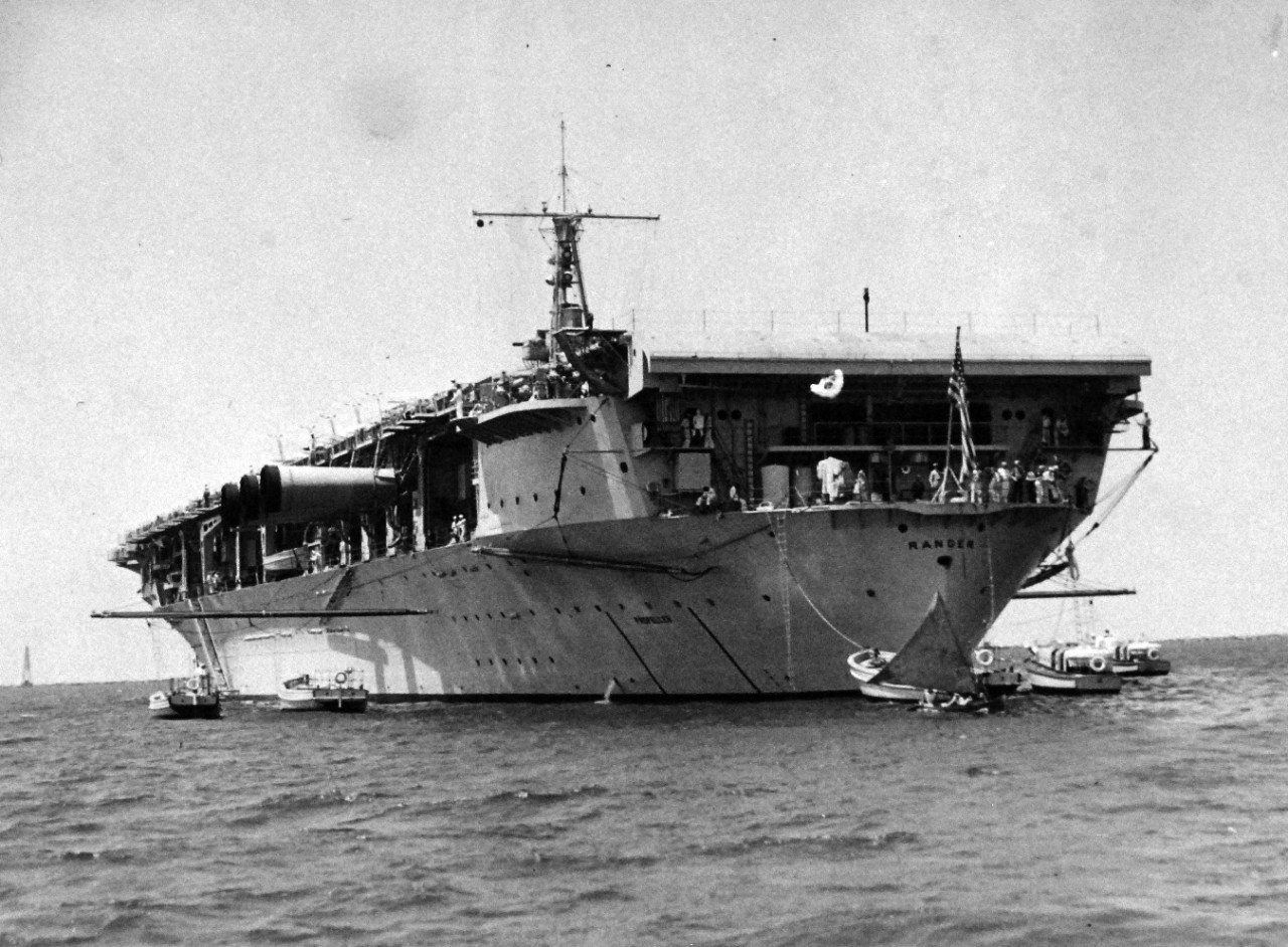 80-G-462860:  USS Ranger (CV-4), 1935.     Three-fourths  rear view of USS Ranger (CV-4) in Colon Harbor, Canal Zone, 6 April 1935.   Not the smoke stacks in down position.   Official U.S. Navy photograph, now in the collections of the National Archives.    (2014/7/16).