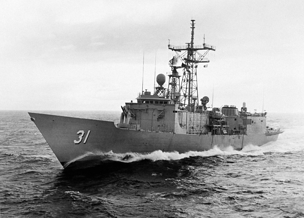 330-CFD-DN-SN-84-02843: USS Stark (FFG-31), 1982.   A port bow view of the guided missile frigate USS STARK (FFG 31) underway.  Photographed on July 13, 1982.    U.S. Navy Photograph, now in the collections of the U.S. National Archives.