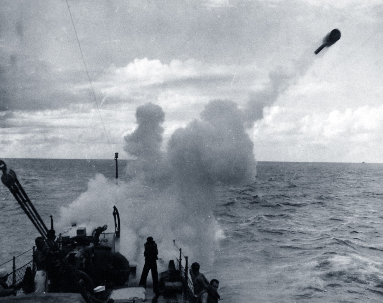 <p>80-G-40330: Battle of the Atlantic: Weapons: K-Gun. A depth charge is fired from a “K” gun by a U.S. Navy boat patrolling the coast, between February 1942 and 1943.&nbsp;</p>

