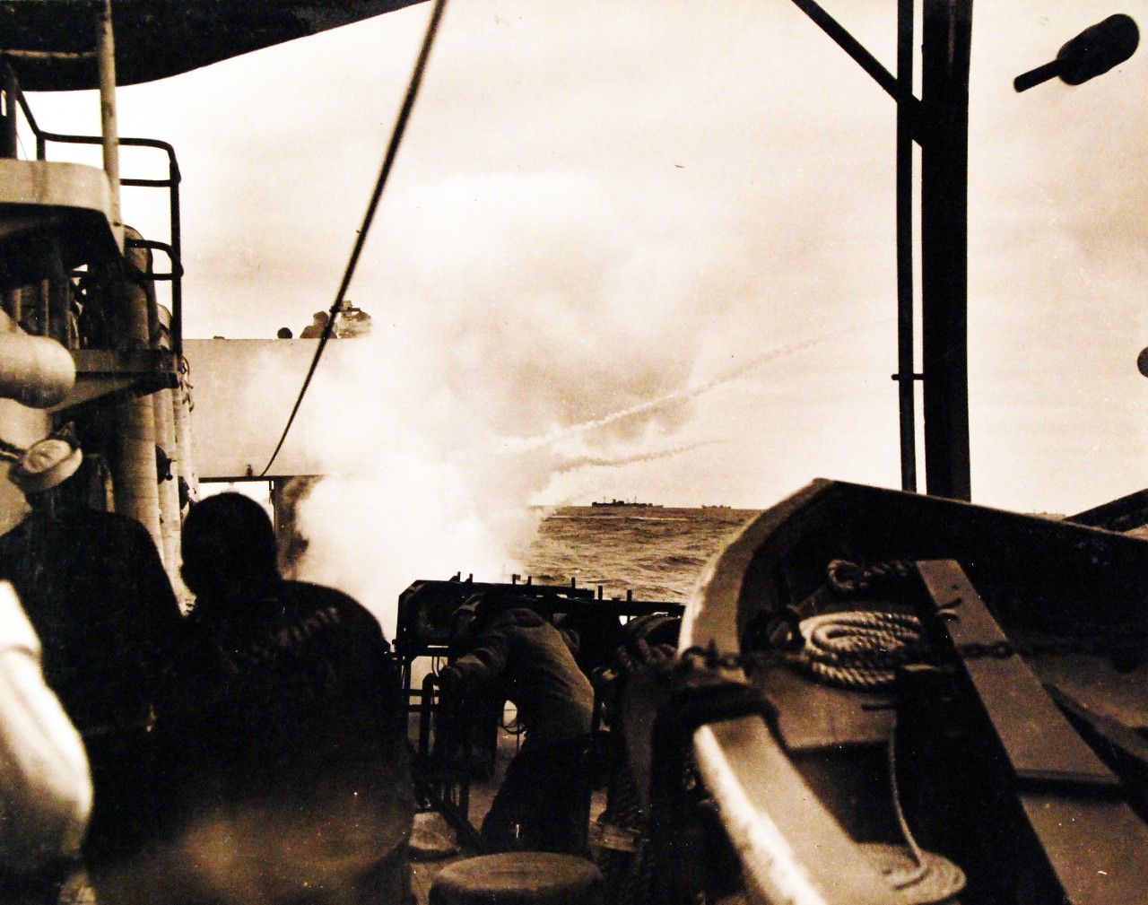 <p>80-G-456709: A “K” gun is fired from USCG Cutter Spencer at an unidentified submarine while escorting a large Atlantic convoy. Photograph received 1950. Official U.S. Navy Photograph, now in the collections of the National Archives. (2016/08/02).</p>
