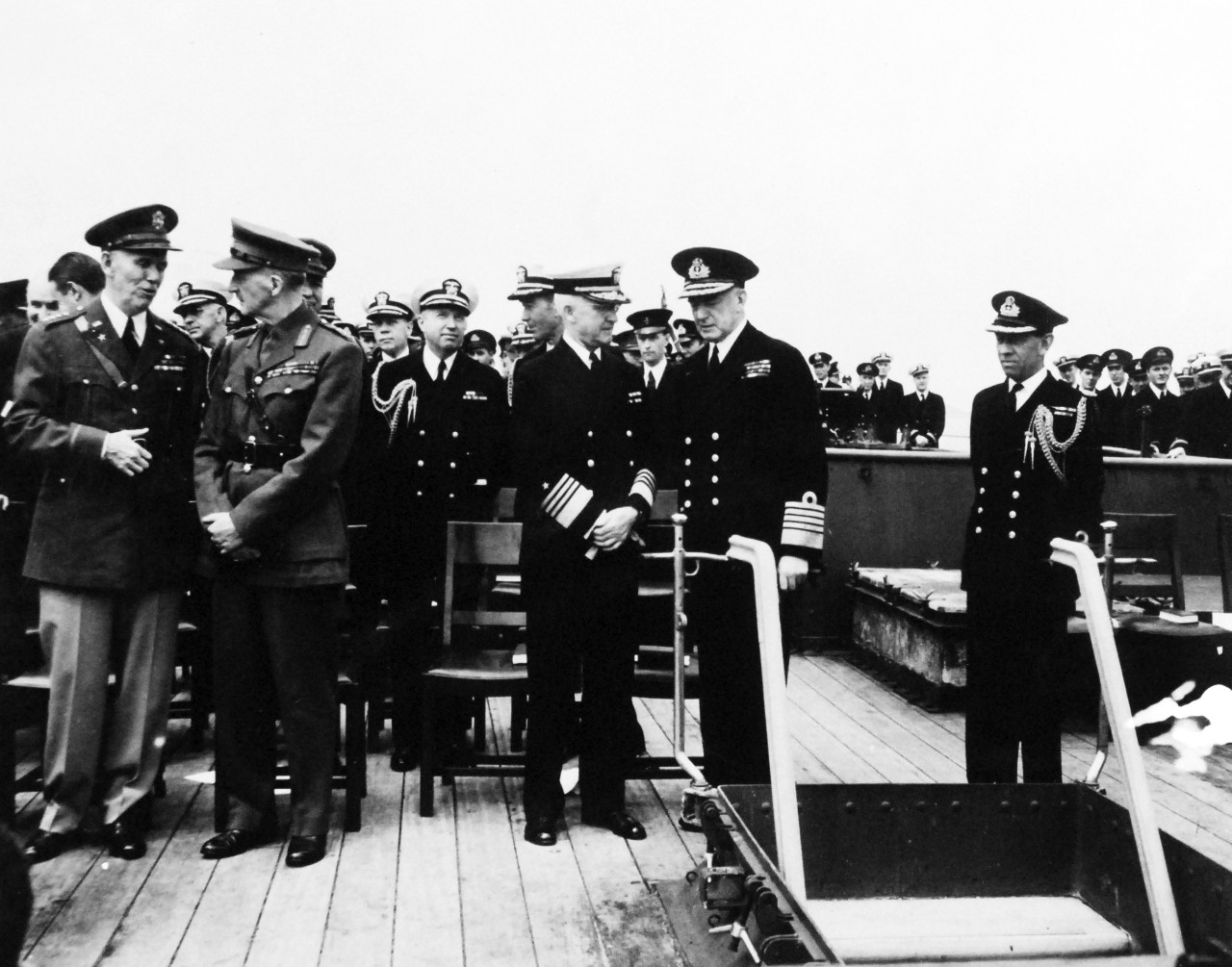 80-G-26859: Atlantic Charter, August 1941.  Informal group on deck of Royal Navy battleship HMS Prince of Wales following church services during the Atlantic Charter meeting.  Standing, left to right:  General George C. Marshall; General Sir John Dill; Admiral Harold R. Stark; and Admiral Sir Dudley Pound.   Photograph released August 1941.   Official U.S. Navy Photograph, now in the collections of the National Archives.  (2016/03/22).