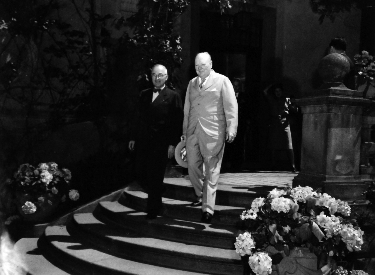 80-G-49967:  Potsdam Conference, July-August 1945.   Shown: Prime Minister Winston S. Churchill pays a visit to President Harry S. Truman at the “Little White House” in Potsdam, Germany.   Photographed by CPhoM Wm. Belknap, received July 16, 1945.  Official U.S. Navy Photograph, now in the collections of the National Archives.  (2016/02/23).
