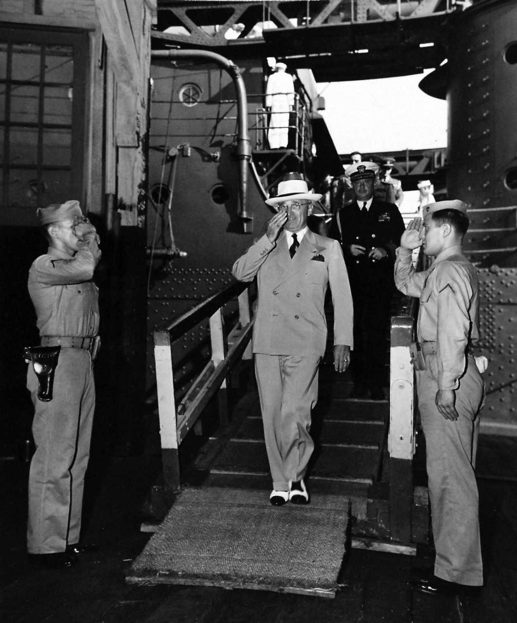 80-G-700364:  Potsdam Conference, July-August 1945.   President Harry S. Truman and his Aide, Captain James K. Vardaman, coming onboard USS Augusta (CA-31) for return voyage from Potsdam Conference.   Photograph released:  August 6, 1945.  Official U.S. Navy photograph, now in the collections of the National Archives.  (2016/06/28).