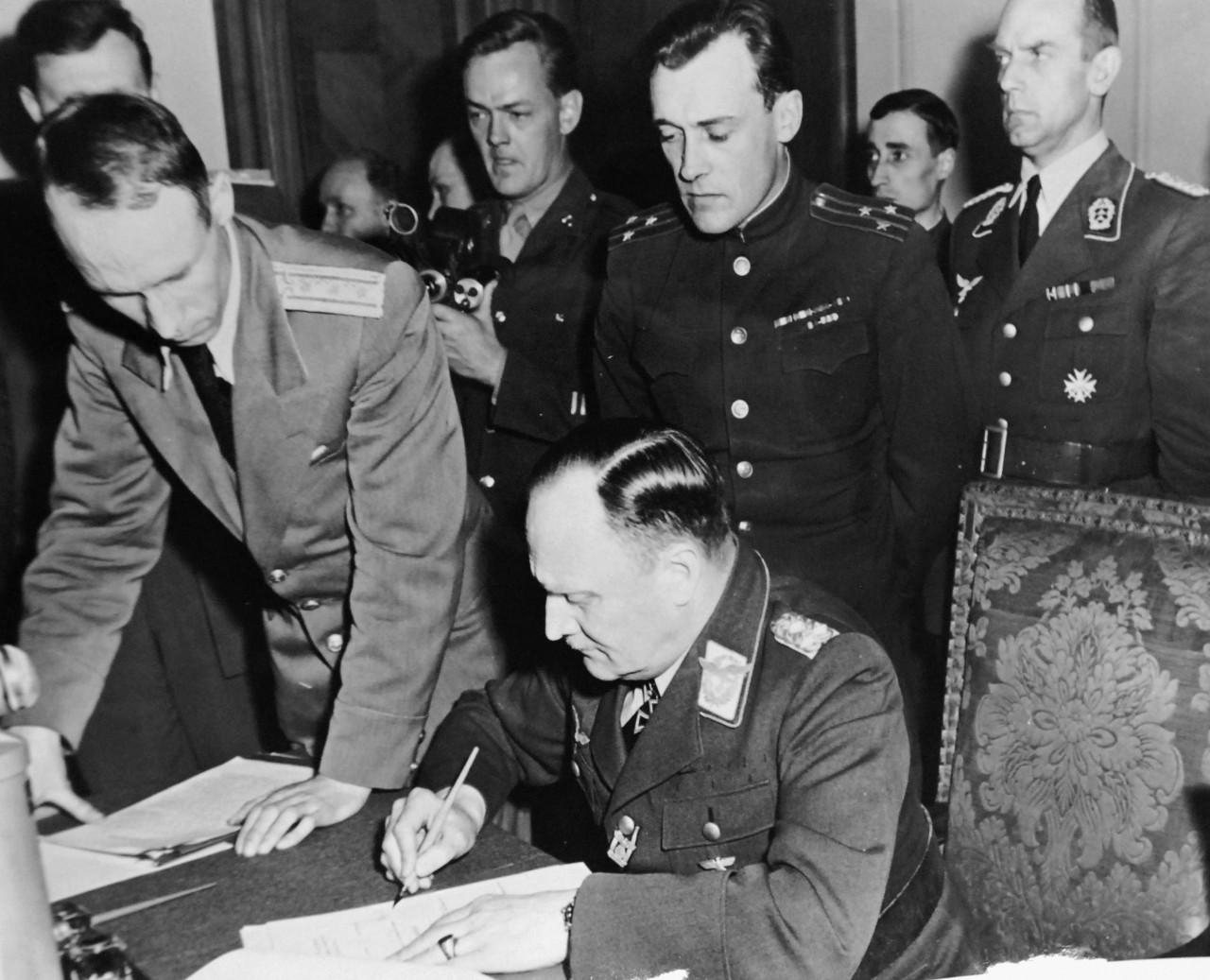 111-SC-27431: Surrender of Germany, 9 May 1945.  Colonel General P H. Stumpf, signing the ratified surrender terms for the extinct Luftwaffe at the Russian Headquarters in Berlin, Germany.  U.S. Army Photograph.  Courtesy of the Library of Congress Collection, Lot-8988. (2015/10/16).