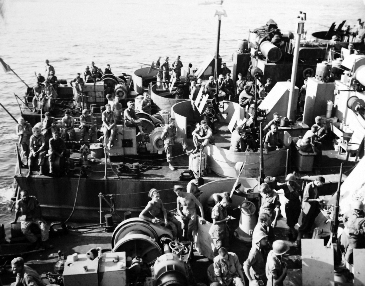 80-G-87396:  Operation Avalanche, September 1943.  American air-borne troops rest aboard English LCI’s before going into battle for Salerno, Italy.    Photograph released September 12, 1943.     U.S. Navy photograph, now in the collections of the National Archives.  (2017/04/04).