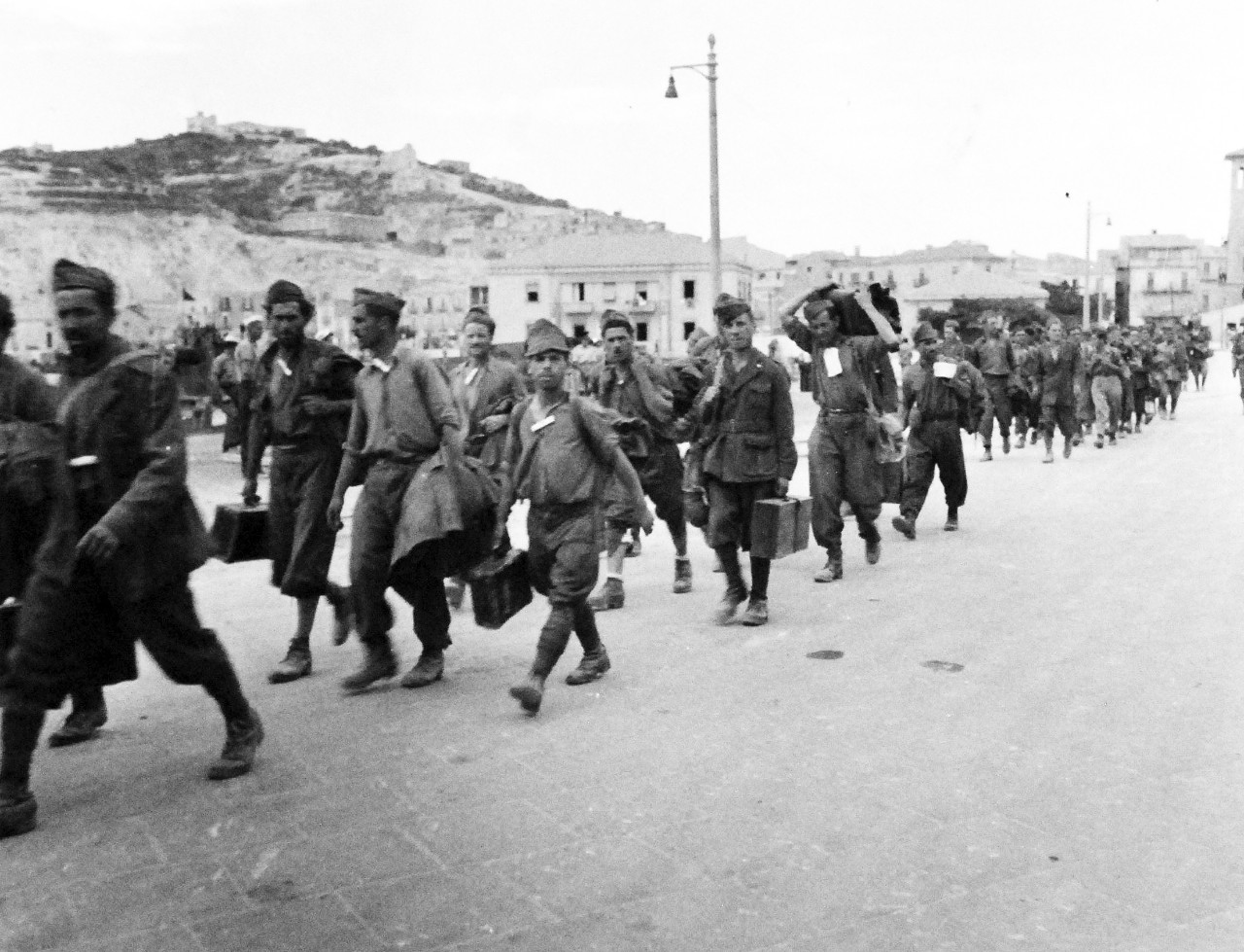 80-G-55364:   Operation Husky, July-August 1943.   Italian Prisoners at Licata, Sicily, Italy.   Photograph received November 11, 1943.  Official U.S. Navy Photograph, now in the collections of the National Archives.  (2015/4/28). 