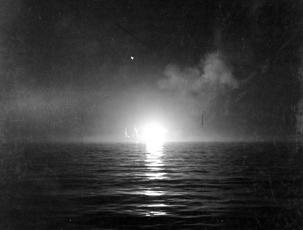 80-G-74836:   Operation Husky, July-August 1943.  Night shore bombardment by the Royal Navy monitor Abercrombie off the coast of Gela, Sicily.   Photographed by USS Boise (CL-47), July 12 1943.    Official U.S. Navy Photograph, now in the collections of the National Archives.  (2018/02/14).    