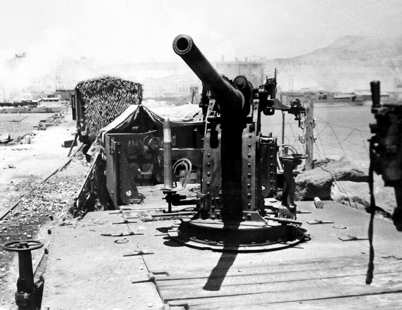 Operation Husky, July-August 1943. Umbrella on the Roof.  Mounted on the roof of an armored car to fight off Allied attacks, this Italian 76mm. gun failed to raise enough of an “umbrella” of fire to protect the car from capture.  The car was seized soon after the opening of the Sicilian invasion.  Photograph released August 10, 1943.  Photographed through Mylar sleeve. U.S. Navy Photograph. Courtesy of the Library of Congress. (2015/10/30).