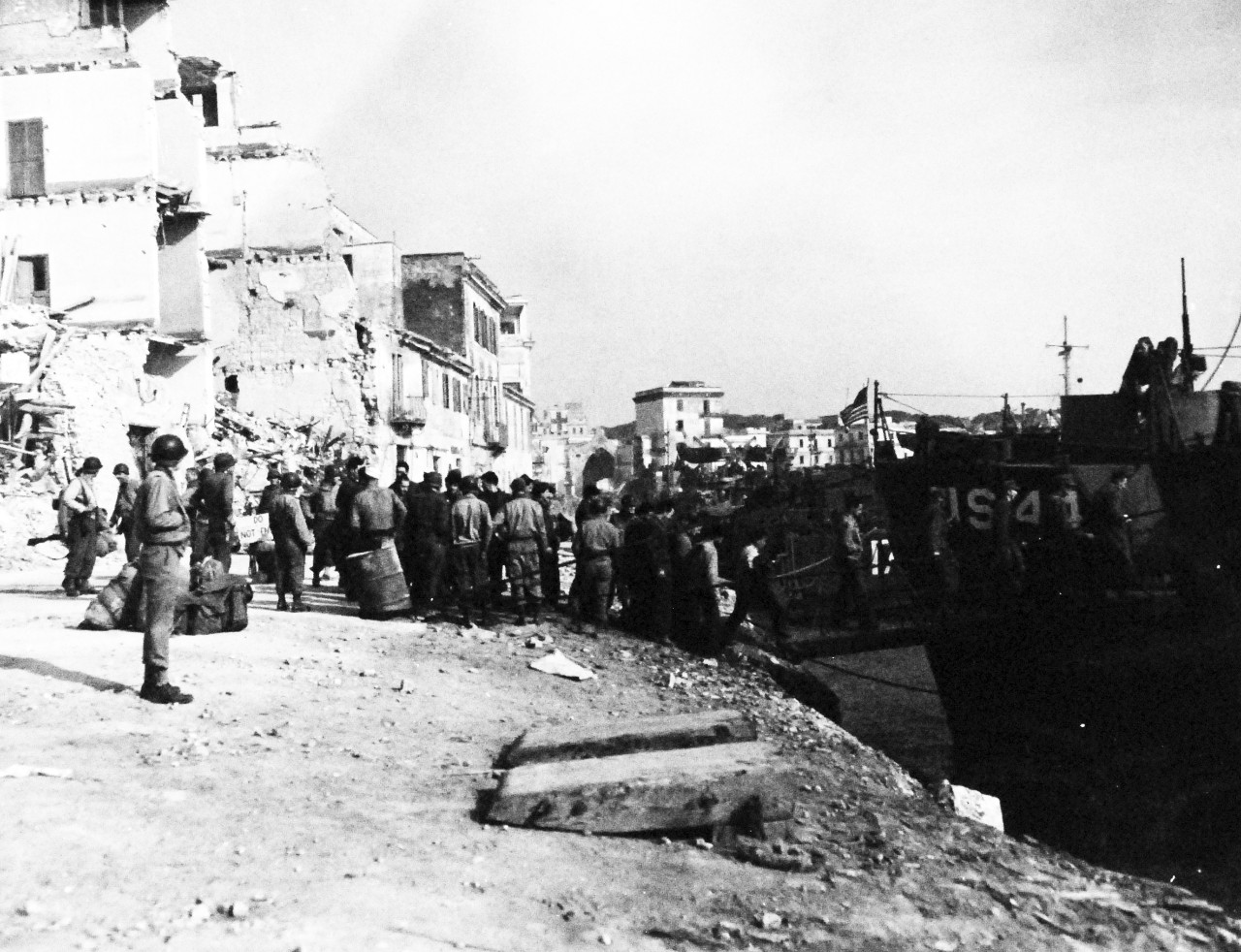 80-G-59386:   Battle of Anzio, January-June 1944.    Nazi troops, now prisoners of war, boarding an LCI at Anzio, Italy, following their surrender in February 1944.   Photograph possibly received on 28 April 1944.    Official U.S. Navy Photograph, now in he collections of the National Archives.  (2014/03/12).    