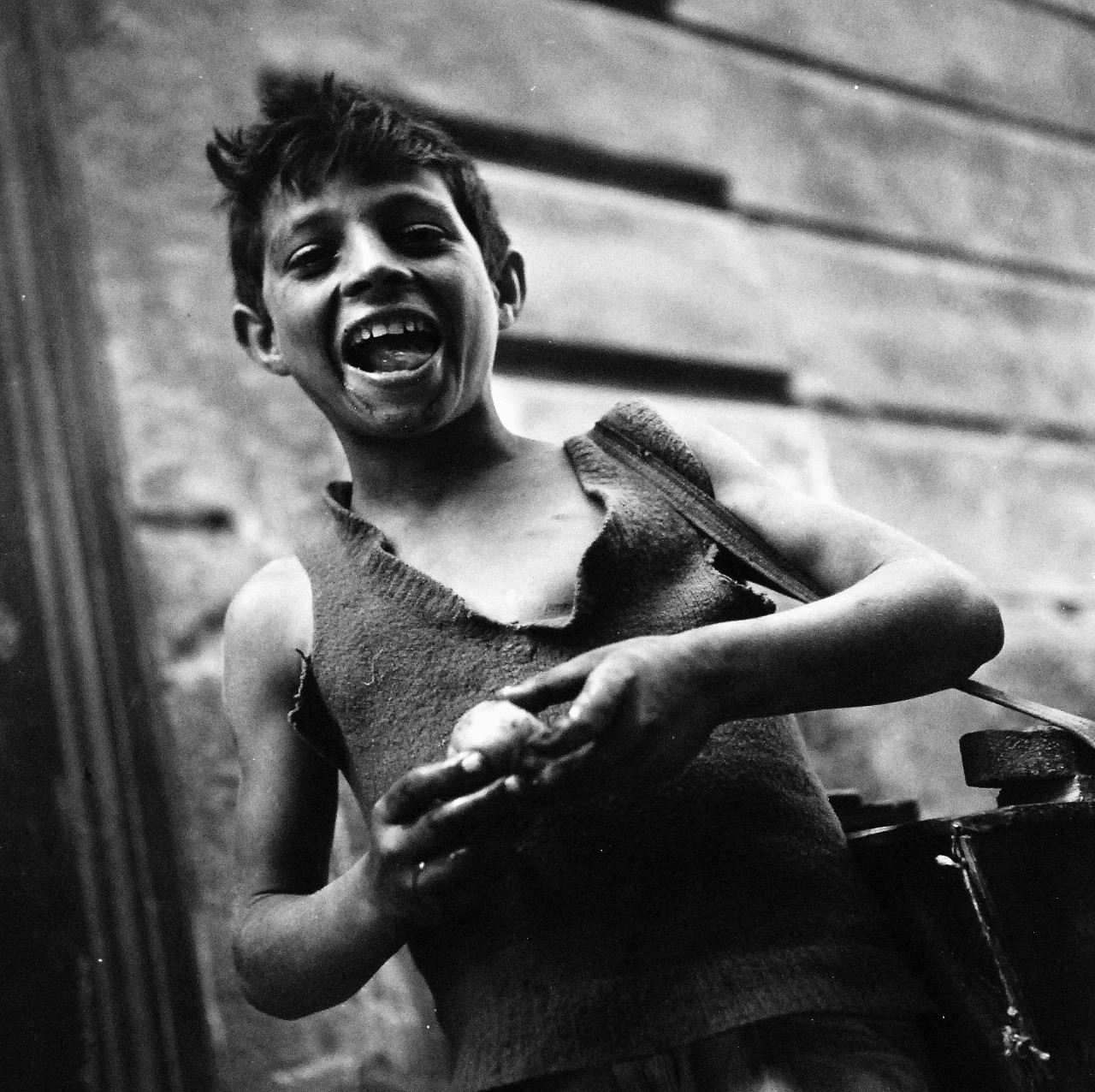 80-G-474163:   Naples, Italy, August 1944.   Boy enjoying fruit. Steichen Photograph Unit:   TR-13050.   Photographed by Lieutenant Wayne Miller, August 1944.  Official U.S. Navy Photograph, now in the collections of the National Archives. (2015/12/08). 