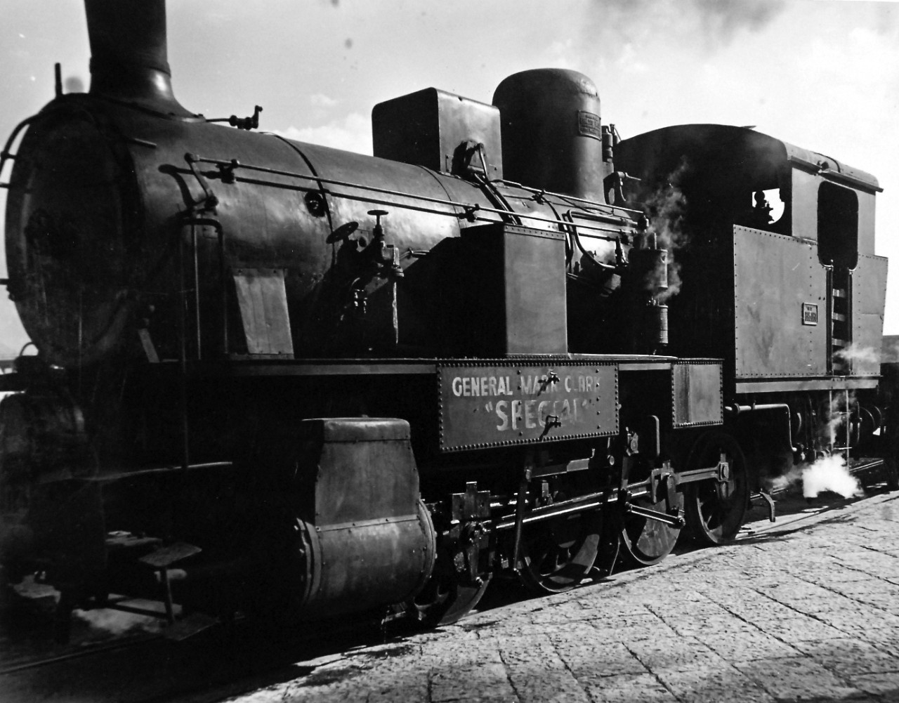 80-G-54366:   Naples, Italy, November 1943.    American soldiers named this Italian locomotive after General Mark Clark, Commanding Officer of the Fifth Army.  Photograph released November 4, 1943.  U.S. Navy photograph, now in the collections of the National Archives.  (2016/06/28).