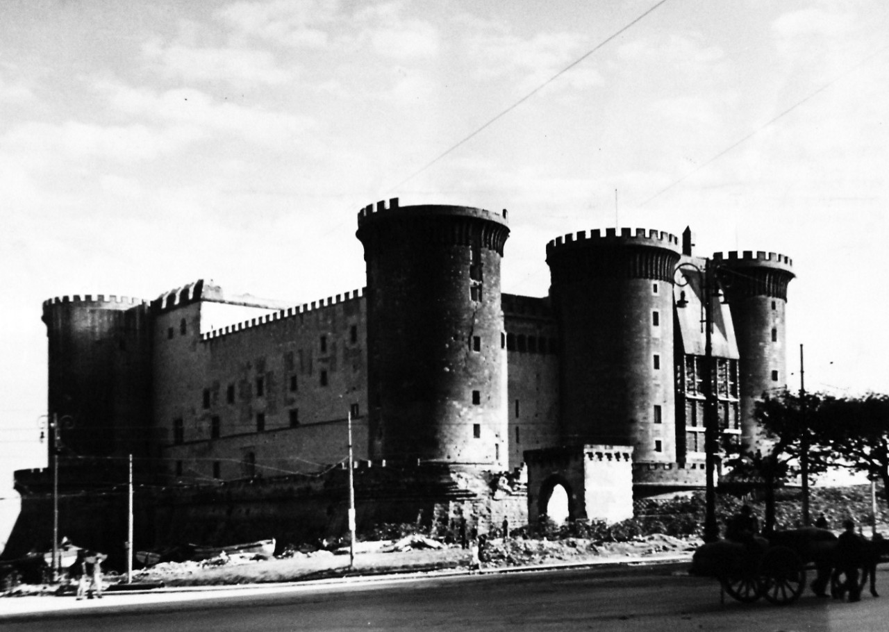 80-G-54373:  Naples, Italy, November 1943.    City after the allied victory.  The historic building, castle, Maschio Angioino, is still one of the landmarks of the city.  Photograph released November 4, 1943.  U.S. Navy photograph, now in the collections of the National Archives.  (2016/06/28).