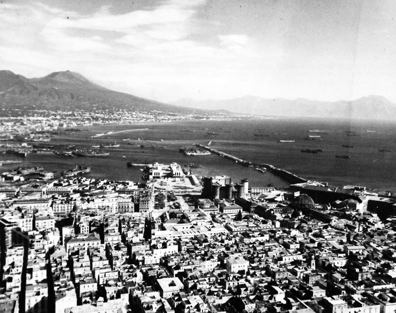 80-G-54374:  Naples, Italy,  November 1943.   Mount Vesuvius in the background.  Photograph released November 9, 1943.   Official U.S. Navy photograph, now in the collections of the National Archives.  (2016/06/28).