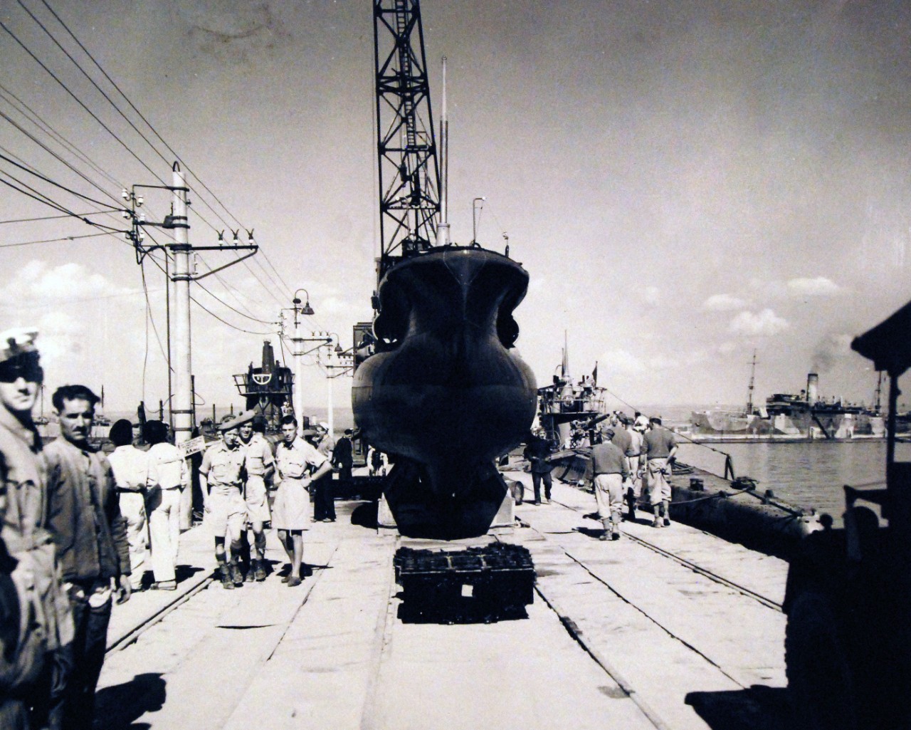 80-G-43773:  Italian CB Midget Submarine.    Italian warships surrendered at Taranto, Italy.  Bow on view of an Italian CB midget submarine, showing the turnip like bulge in their underwater construction.  Photograph released November 17, 1943.  Official U.S. Navy Photograph, now in the collections of the National Archives.   (2015/10/13).