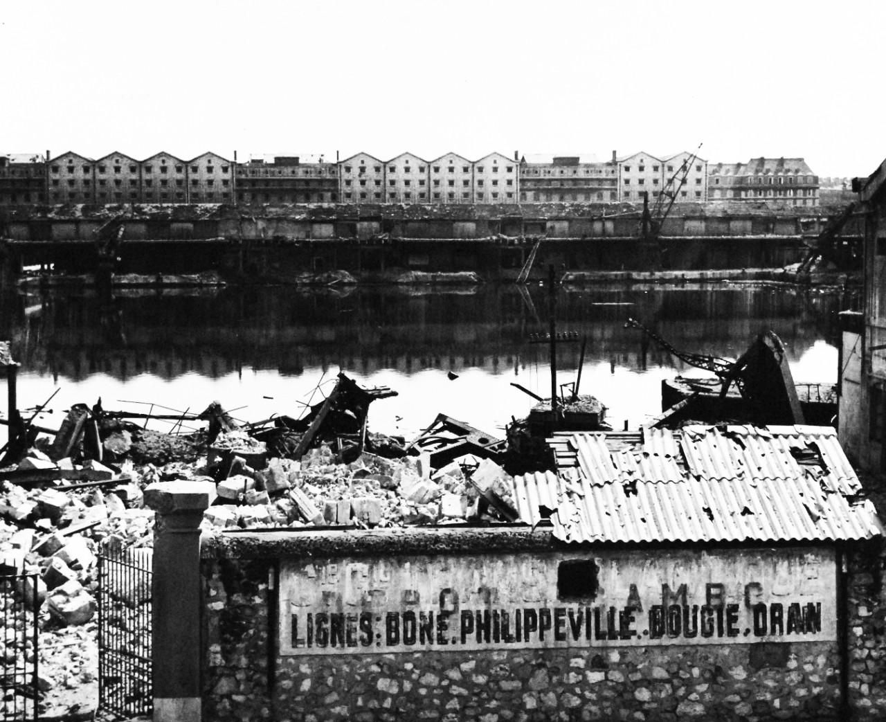 80-G-364062:  Invasion of Southern France, Marseille, August 1944.   Destruction to the harbor and installations at Marseilles, France.  Taken by crew of USS Catoctin (AGC-5).  Photograph received on 2 April 1946.   Official U.S. Navy Photograph, now in the collections of the National Archives.  (2014/7/10).