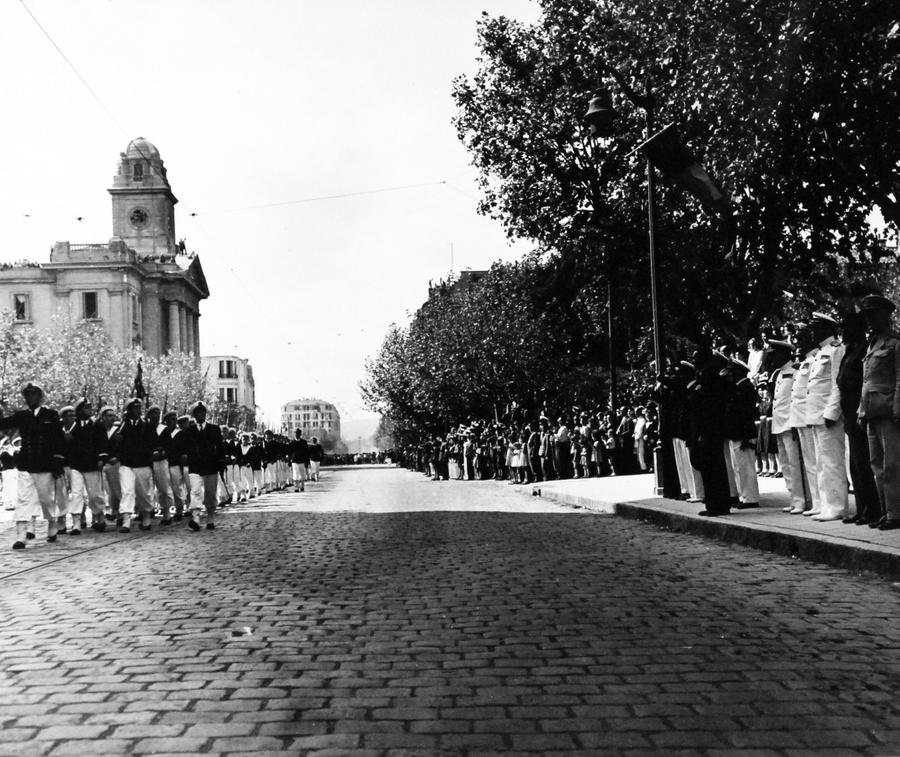 80-G-248727:   Invasion of Southern France, Toulon,  September 1944.   Ceremonies in Toulon celebrating the liberation of France.  Taken by USS Philadelphia (CL-41), 14 September 1944.   General scene during the parade.  Official U.S. Navy Photograph, now in the collection of the National Archives.  (2014/4/10). 