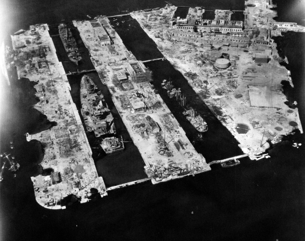80-G-364000:  Invasion of Southern France, Toulon, August 1944.   Aerial view of the destruction to the harbor and installations at Toulon, France.  Taken by crew of USS Catoctin   (AGC 5).  Photograph received on 2 April 1946.   Official U.S. Navy Photograph, now in the collections of the National Archives.  (2014/7/10).