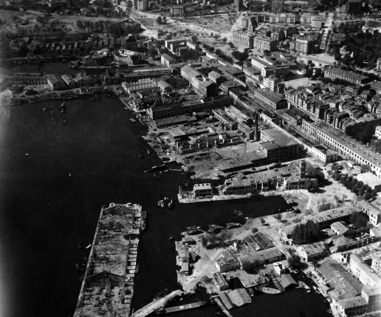 80-G-364003:  Invasion of Southern France, Toulon, August 1944.   Aerial view of the destruction to the harbor and installations at Toulon, France.  Taken by crew of USS Catoctin   (AGC 5).  Photograph received on 2 April 1946.   Official U.S. Navy Photograph, now in the collections of the National Archives.  (2014/7/10).