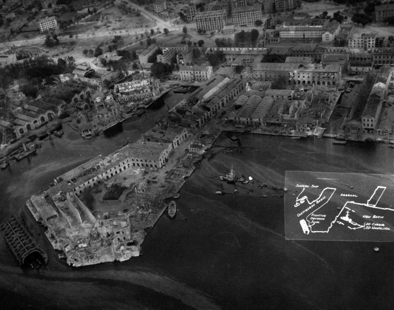 80-G-364017:  Invasion of Southern France, Toulon, August 1944.   Aerial view of the destruction to the harbor and installations at Toulon, France.  Taken by crew of USS Catoctin   (AGC 5).  Photograph received on 2 April 1946.   Official U.S. Navy Photograph, now in the collections of the National Archives.  (2014/7/10).