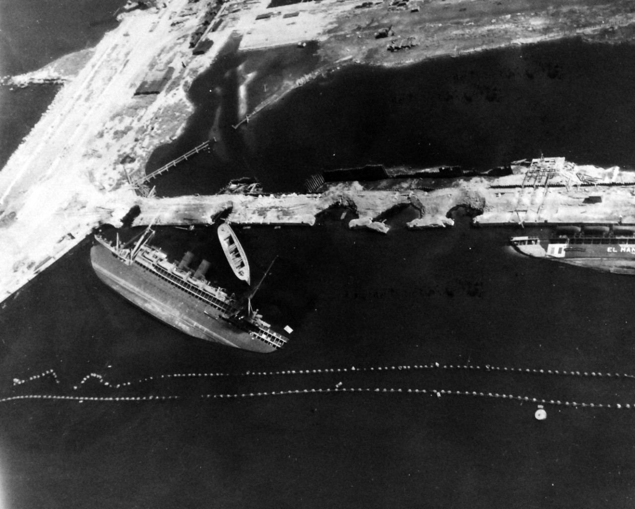 80-G-364030:  Invasion of Southern France, Toulon, August 1944.   Aerial view of the destruction to the harbor and installations at Toulon, France.  Taken by crew of USS Catoctin (AGC-5).  Photograph received on 2 April 1946.   Official U.S. Navy Photograph, now in the collections of the National Archives.  (2014/7/10).