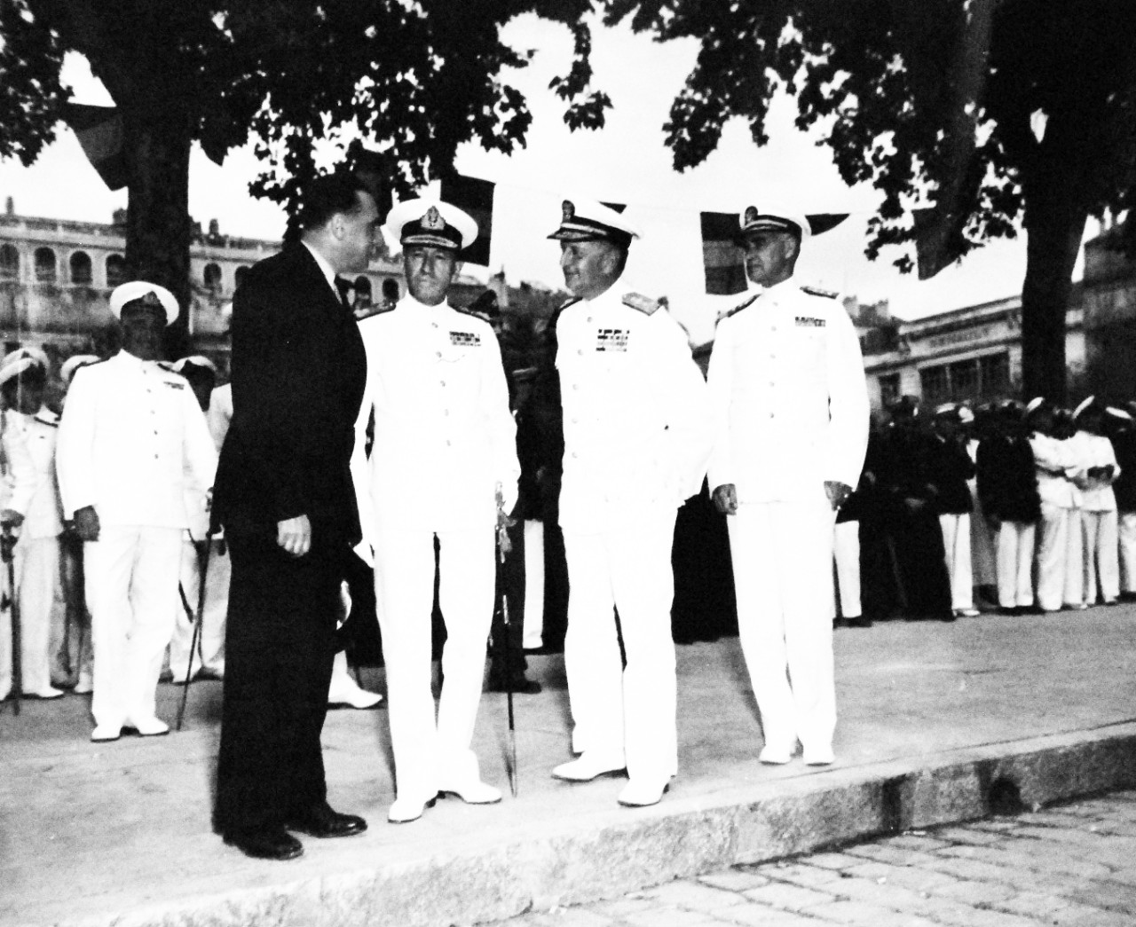 80-G-364101:  Invasion of Southern France, Toulon, August-September 1944.   Allied Naval Commanders of the Mediterranean join in victory celebration at Toulon, France, 14 September 1944.  Shown:  M. Jacquoint, Secretary of French Navy chats with Admiral Sir John H. B. Cunningham, RN, Vice Admiral H. Kent Hewitt, USN, and Rear Admiral Lyal A. Davidson, USN.    Taken by crew of USS Catoctin (AGC-5).    Official U.S. Navy Photograph, now in the collections of the National Arcchives.    Official U.S. Navy Photograph, now in the collections of the National Arcchives.    (2014/7/10).