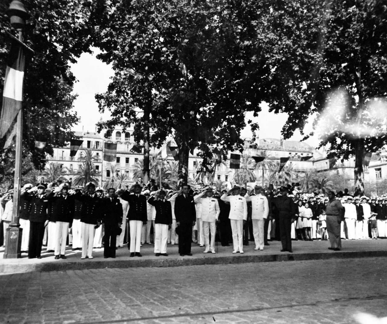 80-G-364102:   Invasion of Southern France, Toulon, August-September 1944.   Allied Naval Commanders of the Mediterranean join in victory celebration at Toulon, France, 14 September 1944.  Salute to colors, left to right:  Director of Engineering, Kohn; Rear Admiral Janyard; Rear Admiral Auboyneau; M. Jacquinot, Secretary of Navy; Admiral Sir John H.B. Cunningham, RN; Vice Admiral H. Kent Hewitt, USN; and Rear Admiral Lyal A. Davidson.  Taken by crew of USS Catoctin (AGC-5).   Official U.S. Navy Photograph, now in the collections of the National Arcchives.    (2014/7/10).