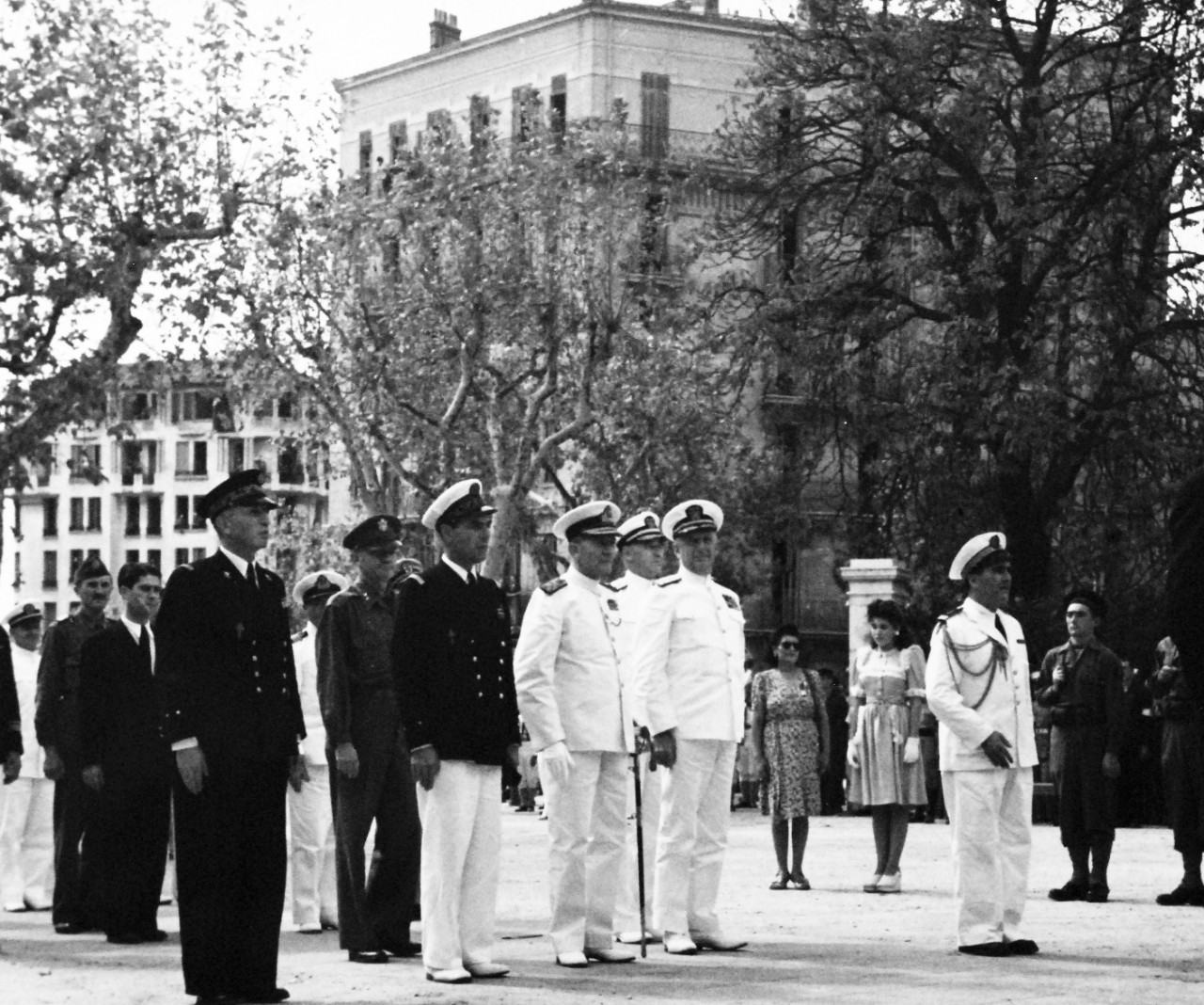 80-G-394117:  Invasion of Southern France, August 1944. High-ranking allied officials honor war dead of Toulon, France, before the War Memorial.  Vice Admiral Henry K. Hewitt, USN, on right, 14 September 1944.   Official U.S. Navy Photograph, now in the collections of the National Archives.   (2014/9/16). 