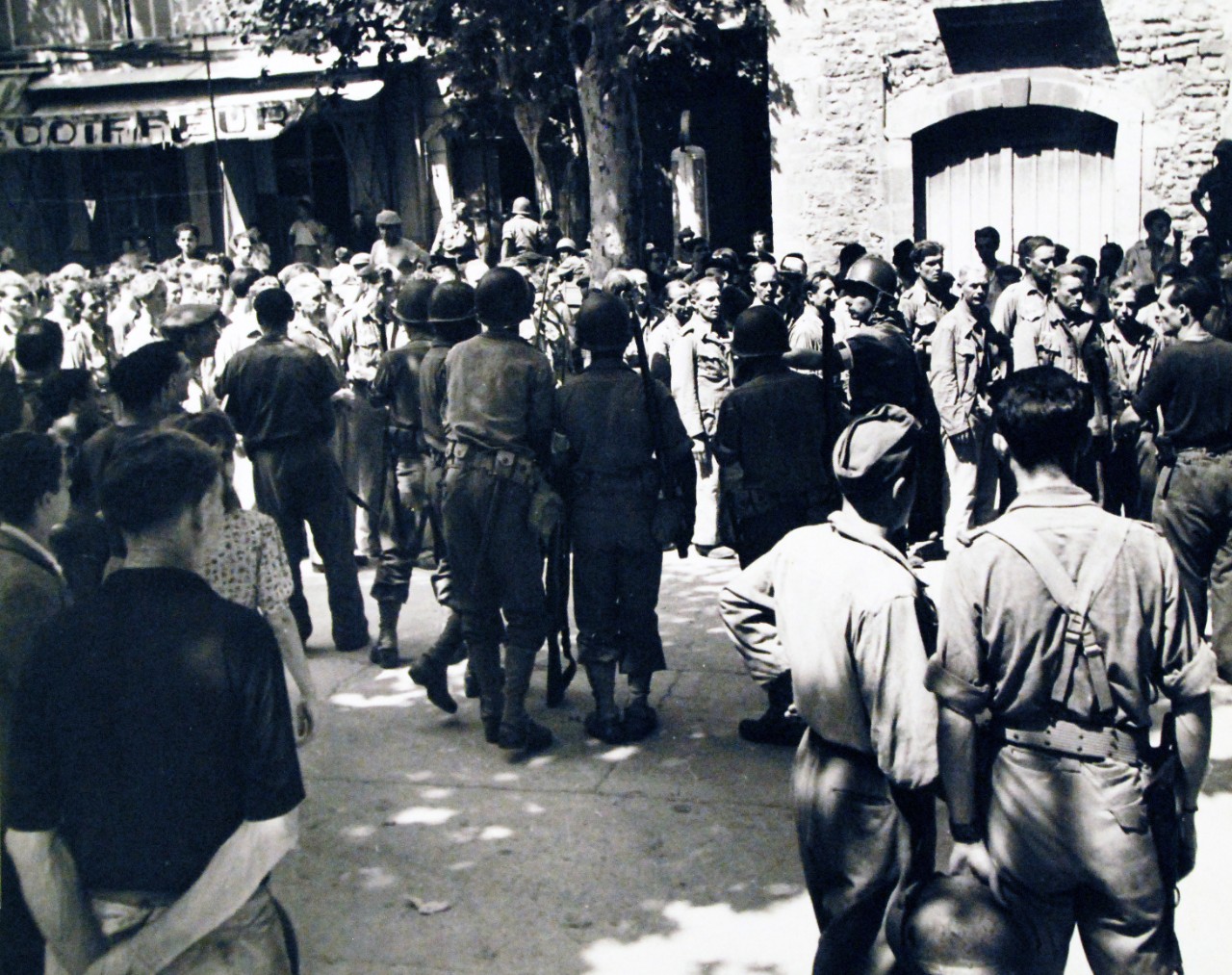 80-G-394120:   Invasion of Southern France, August 1944. Prisoners of War near Toulon, France.   Photograph received 12 July 1948.  Official U.S. Navy Photograph, now in the collections of the National Archives.   (2014/9/16). 