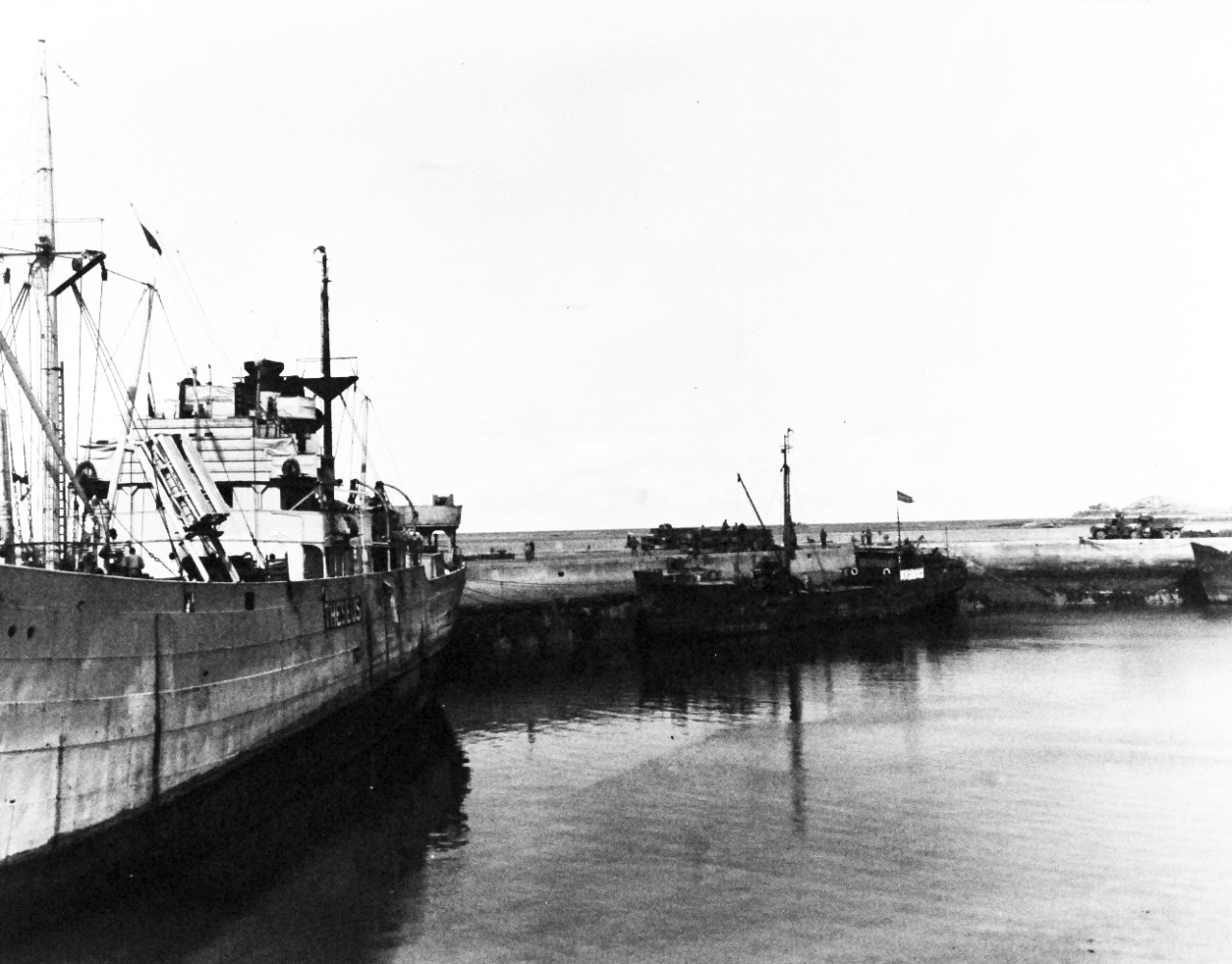 80-G-247130:  Invasion of France, RoscoffAugust-September 1944.    Dutch coaster, Theseus, uploads ammunition at port of Roscoff, France, for battle of Brest, photograph received September 1944.   Official U.S. Navy Photograph, now in the collections of the National Archives.   (2014/3/12).  