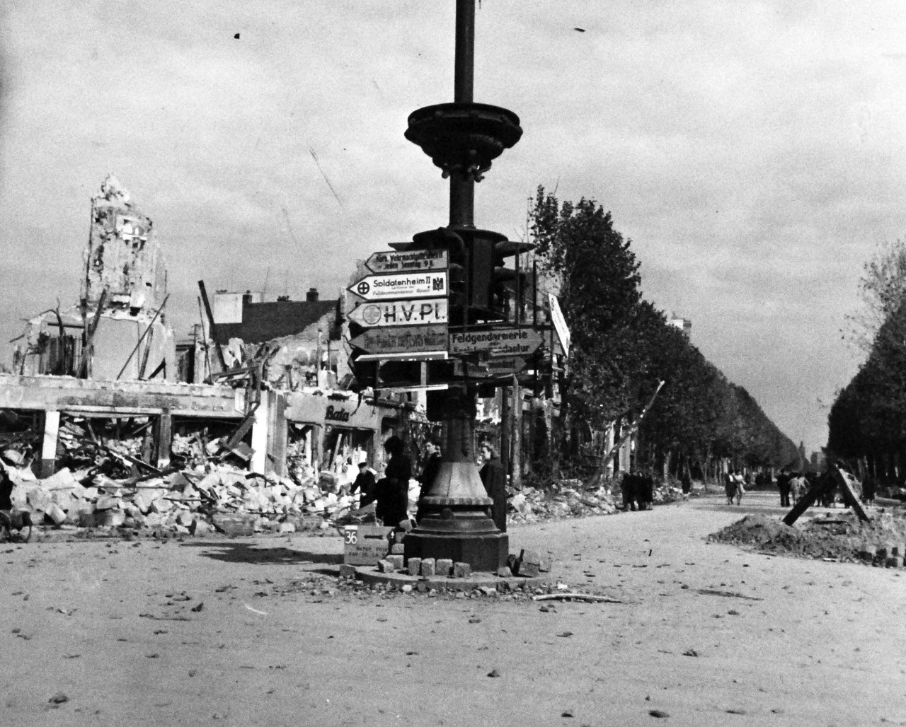 80-G-247179:   Invasion of France, August-September 1944.   German traffic signal post among the wreckage at Le Harve, France, following allied aerial bombing and naval shelling, 25 September 1944.  Official U.S. Navy Photograph, now in the collection of the National Archives.   (2014/03/12).  