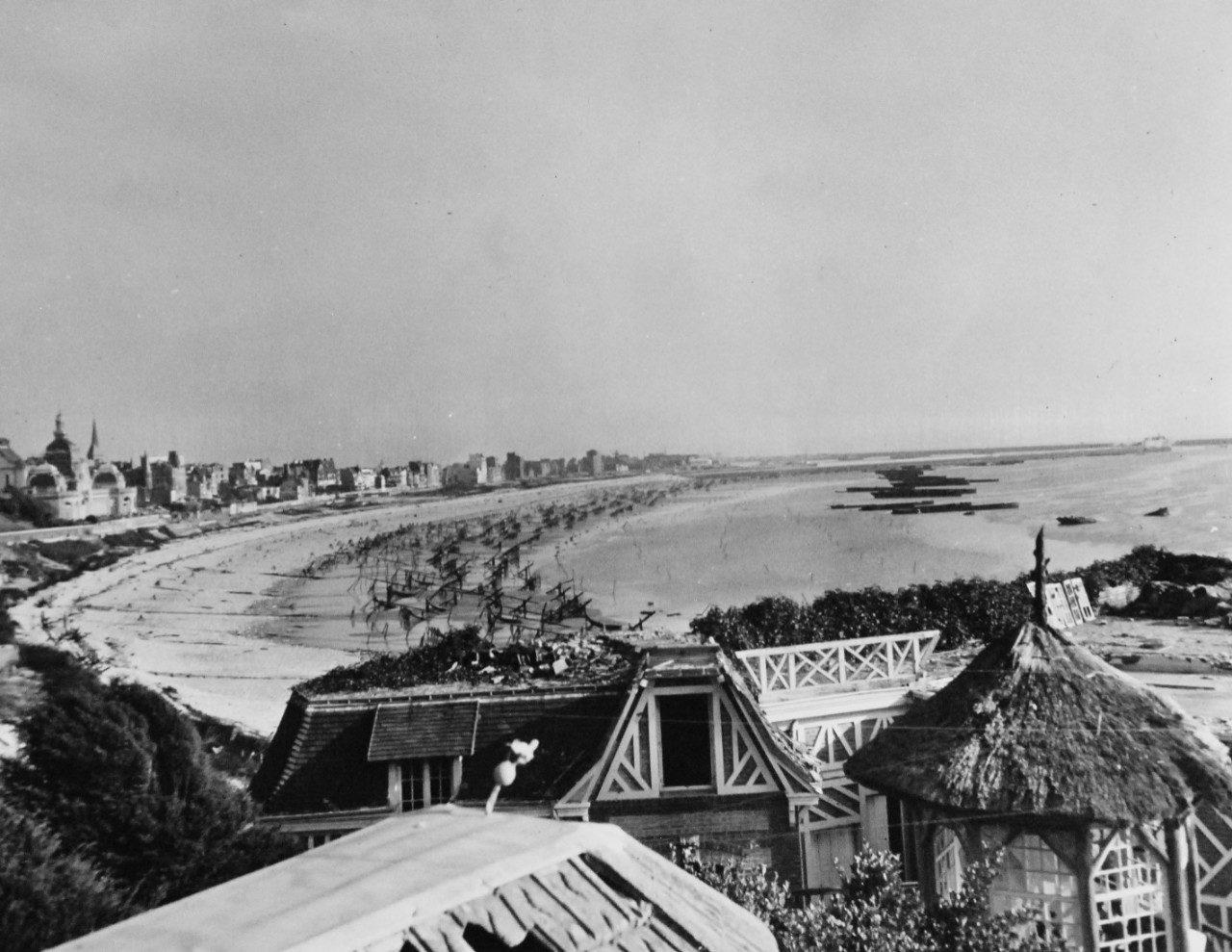 80-G-257306:  Invasion of France, Le Havre, August-September 1944.   German demolition and fierce bombardment by Allies wrought destruction on waterfront of Le Havre, France, recently liberated.   Shown is the beach, studded with obstacles that resemble a junkyard, 22 September 1944.   Official U.S. Navy Photograph, now in the collection of the National Archives.   (2014/10/28).  