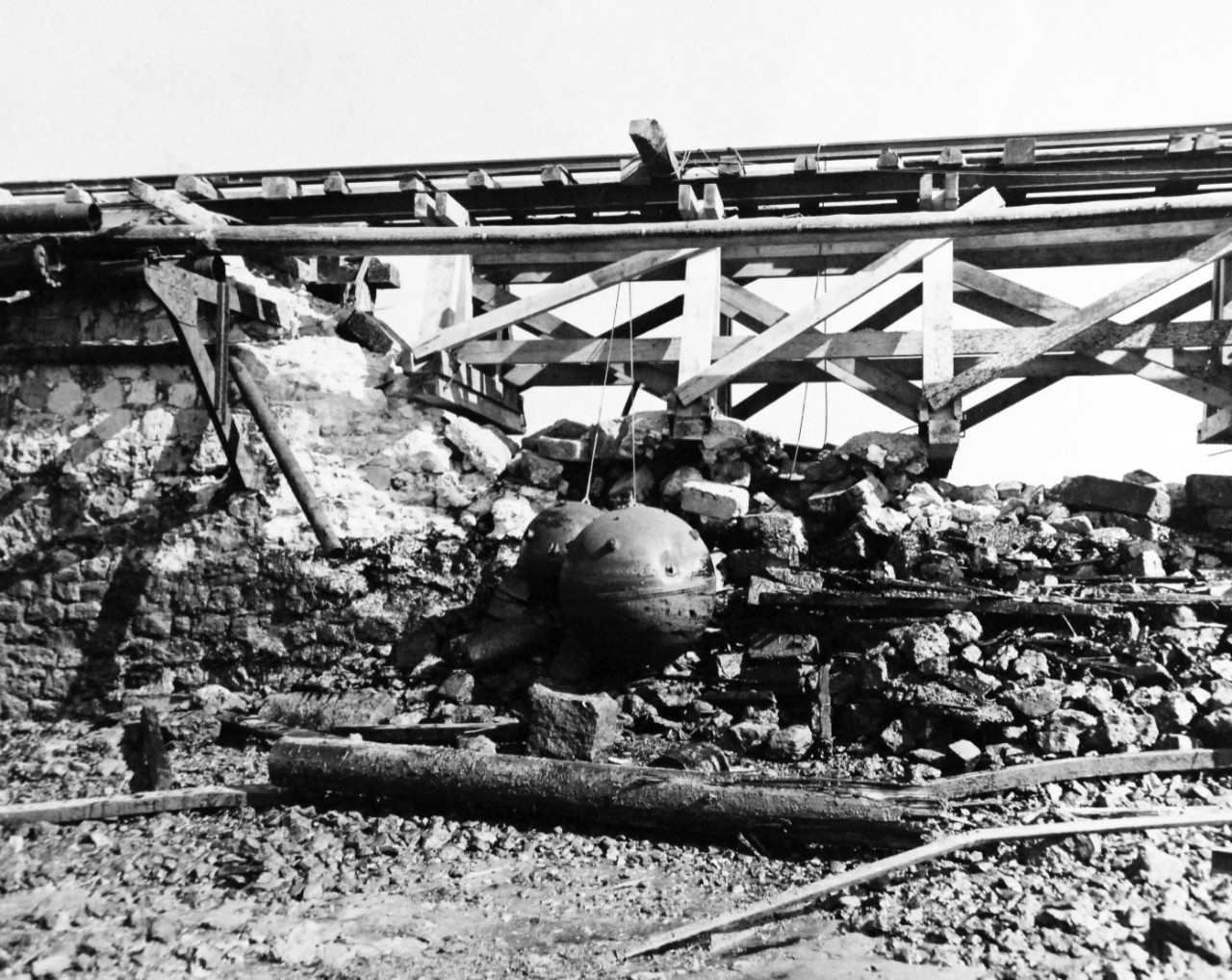 80-G-257404:   Invasion of France, Le Havre, August-September 1944.   After Allied occupation of Le Havre, France, German mines were found lashed to railroad causeway with cables attached to set off charge, 28 September 1944.  Official U.S. Navy Photograph, now in the collection of the National Archives.   (2014/10/28).  