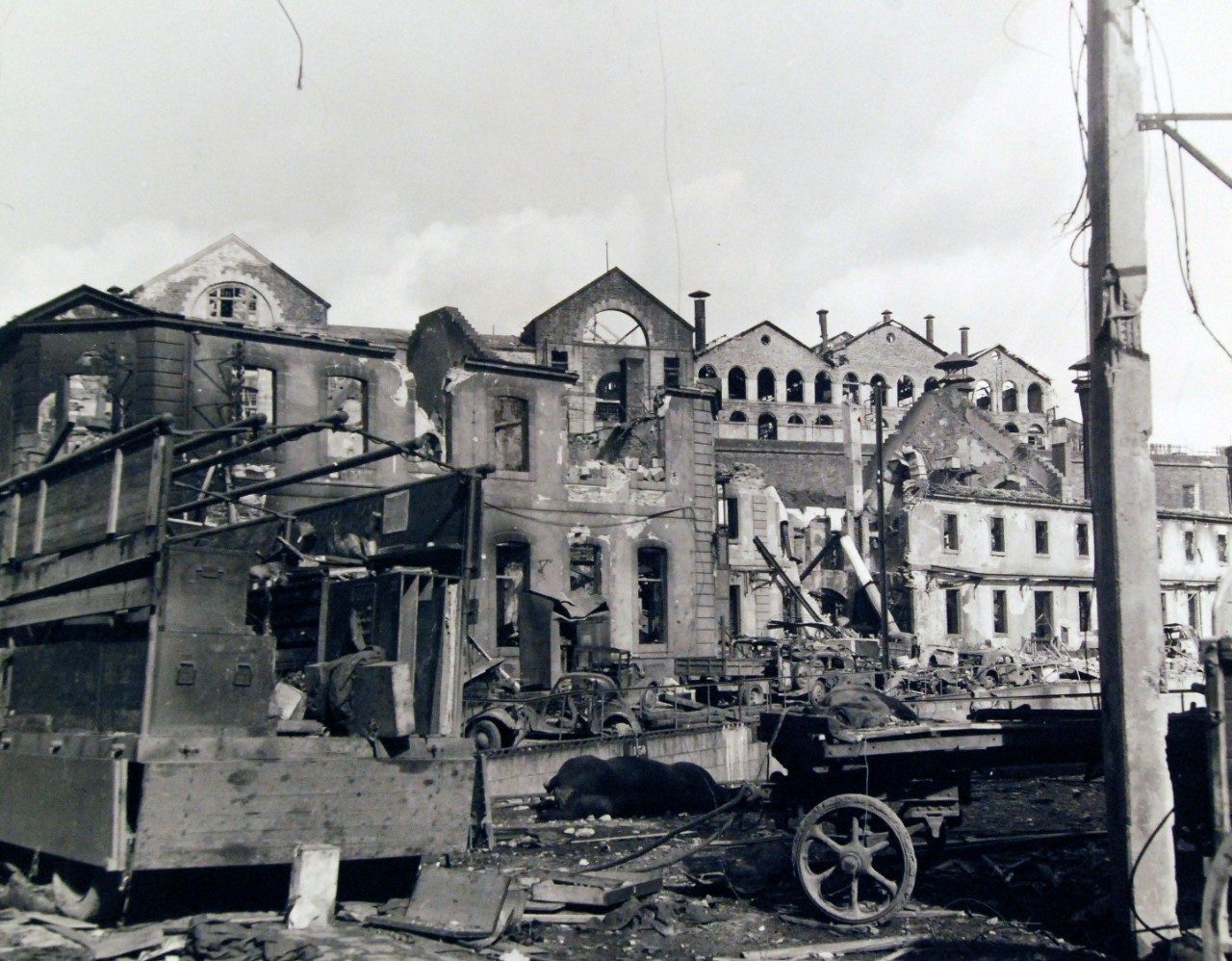 80-G-257414:   Invasion of Southern France, Brest, August-September 1944.   Allied Naval gunfire and aerial bombing of Brest, France, during the battle for the liberation of the city resulted in this devastation and wreckage.  In the foreground is a wrecked work ship truck used by Germans for a mobile repair unit, 5 October 1944.  Official U.S. Navy Photograph, now in the collections of the National Archives.   (2014/10/28).