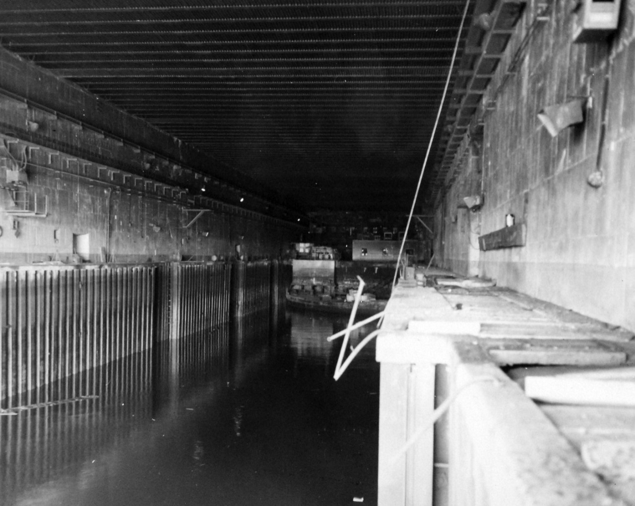 80-G-257415:   Invasion of Southern France, Brest, August-September 1944.   Under massive, thick roofs of concrete and steel, German U-Boats once were sheltered from Allied air raids in these pens at Brest, France, October 1944.   Official U.S. Navy Photograph, now in the collections of the National Archives.   Official U.S. Navy Photograph, now in the collections of the National Archives.   (2014/10/28).