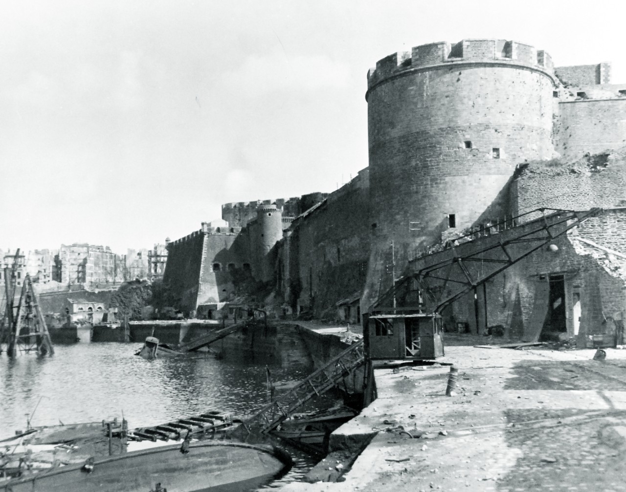 80-G-257417:  Invasion of Southern France, Brest, August-September 1944.    Smashed by American shells, bullet scarred but still intact, this old French-fortress, The Citadel, on Penfield River in Brest once housed part of the beleaguered German garrison, 27 September 1944.  Official U.S. Navy Photograph, now in the collections of the National Archives.   (2014/10/28).
