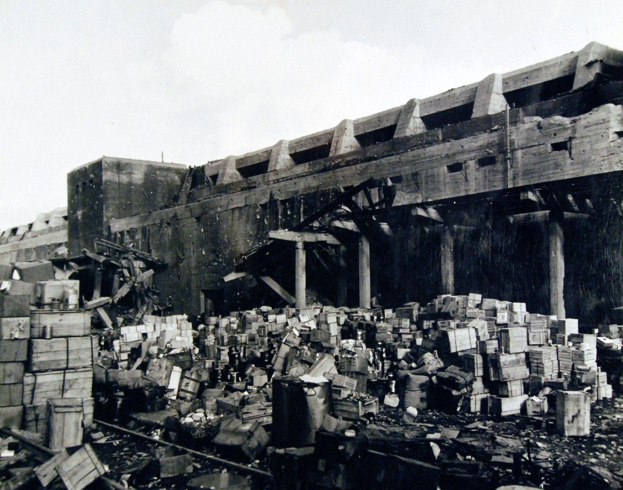 80-G-257479:   Invasion of Southern France, Brest, August-September 1944.   Food ammunition and stores of every kind were found in the rear of the slightly damaged German U-boat pens at Brest, France, following capture of the port by American troops, 27 September 1944.  Official U.S. Navy Photograph, now in the collections of the National Archives.   (2014/10/28).