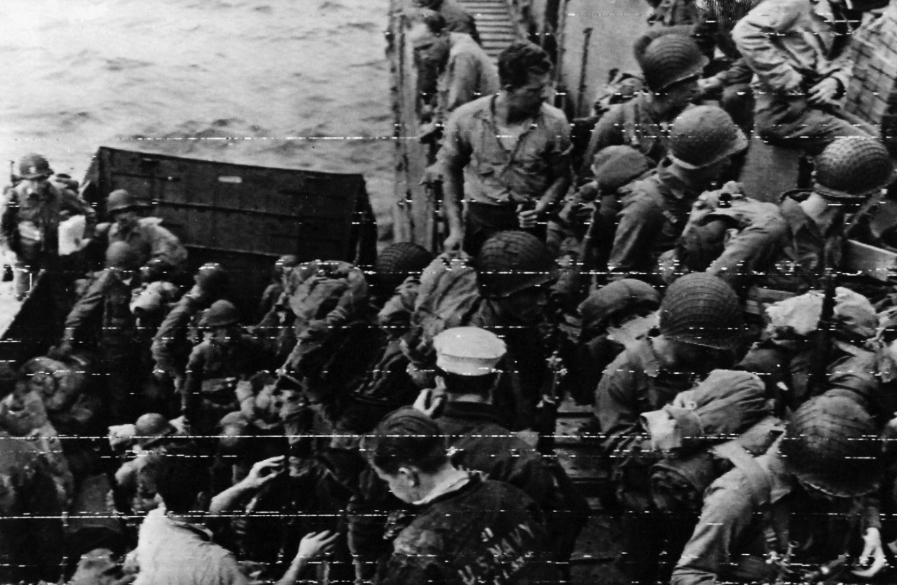 80-G-45667:  Normandy Invasion, June 1944.    U.S. Army troops transfer from LCVP to Navy LCI (L) for long-awaited voyage to enemy shores.    U.S. Navy photograph served from London by U.S. Army Signal Corps Radio-Telephoto, 6 June 1944.   Official U.S. Navy Photograph, now in the collections of the National Archives.  (2014/9/9).  