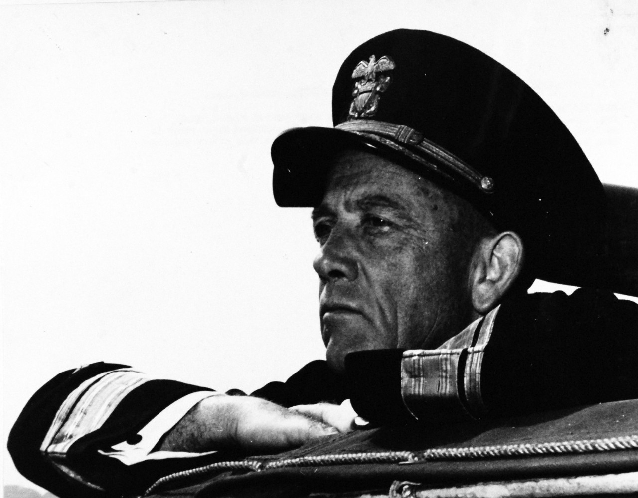 80-G-45681:   Rear Admiral Alan G. Kirk, USN, Commander, U.S. Task Forces, operating as part of the combined Naval Force in England, watches his men during the invasion of Europe.   Photograph released 8 June 1944.  Official U.S. Navy Photograph, now in the collections of the National Archives.  (2014/9/9).  