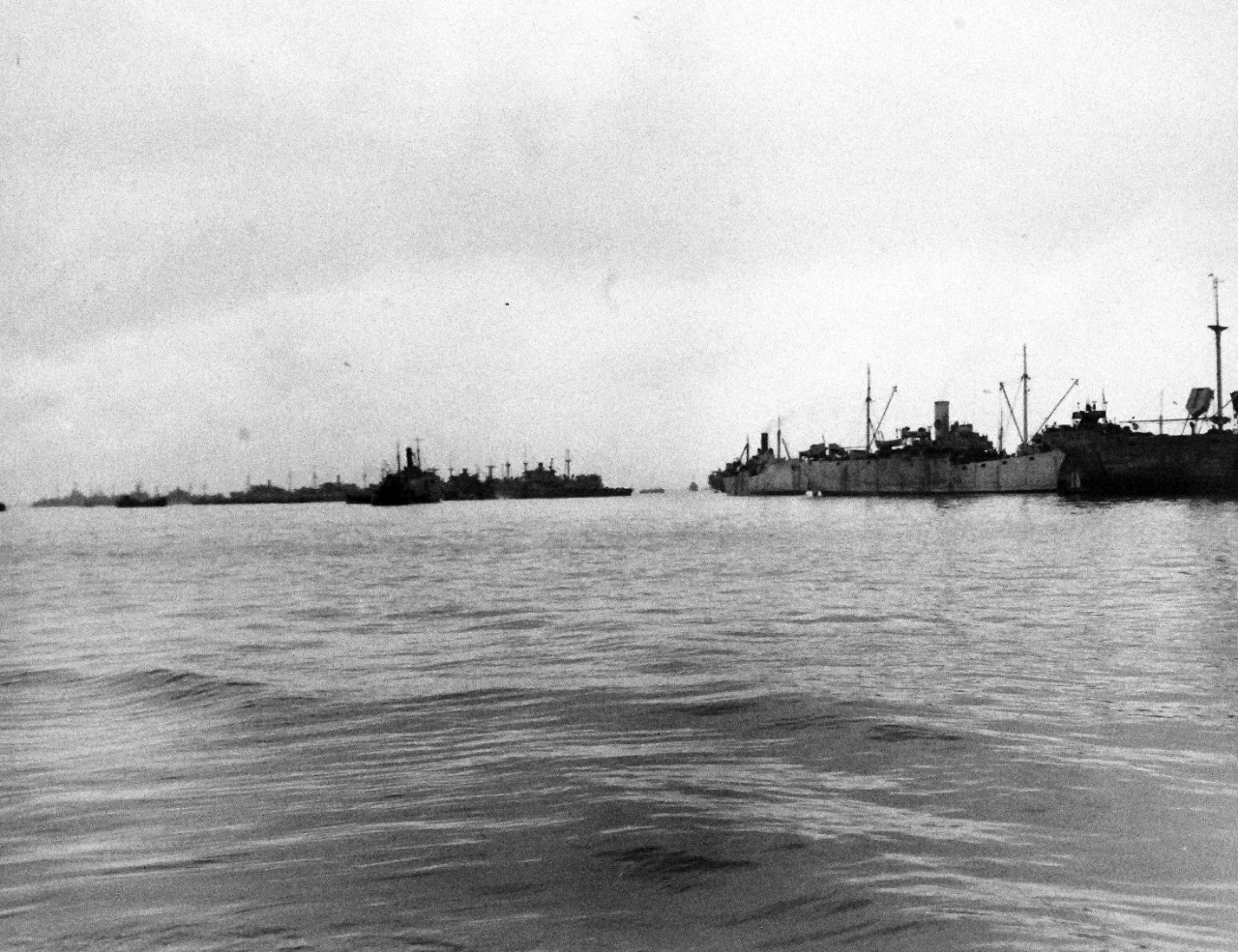 80-G-285124:  Normandy Invasion, Mulberries, June 1944.   A “Gooseberry,” a line of sunken ships forming part of a U.S. Mulberry, a man-made harbor off Omaha Beach, France, protecting landing craft from storms in English Channel.   Photograph released November 7, 1944.  U.S. Navy photograph, now in the collections of the National Archives.  (2016/03/15).