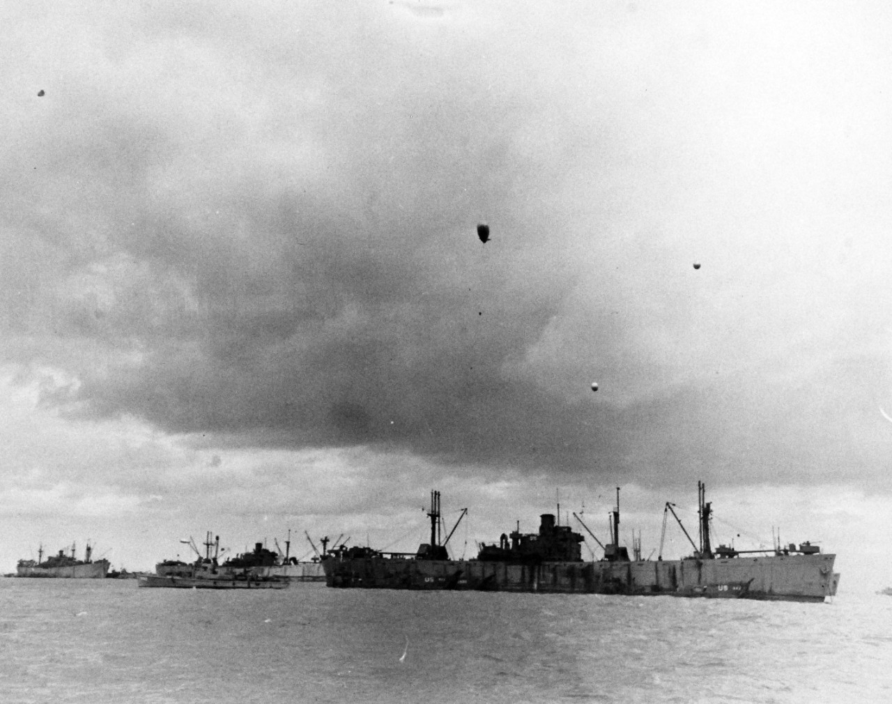 80-G-285127:  Normandy Invasion, Mulberries, June 1944.   A “Gooseberry,” a line of sunken ships forming part of a U.S. Mulberry, a man-made harbor off Omaha Beach, France, protecting landing craft from storms in English Channel.   Photograph released November 7, 1944.  Official U.S. Navy photograph, now in the collections of the National Archives.  (2016/03/15).