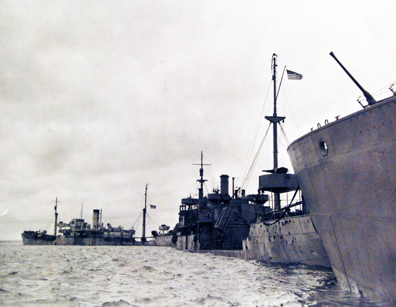 80-G-285129:  Normandy Invasion, Mulberries, June 1944.   A “Gooseberry,” a line of sunken ships forming part of a U.S. Mulberry, a man-made harbor off Omaha Beach, France, protecting landing craft from storms in English Channel.   Photograph released November 7, 1944.  Official U.S. Navy photograph, now in the collections of the National Archives.  (2016/03/15).